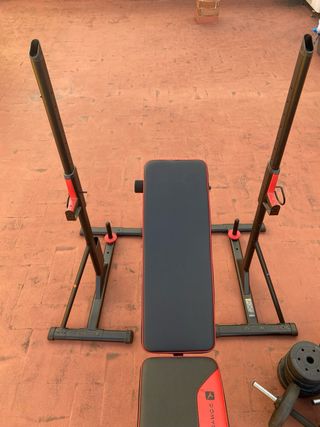 Banco de pesas y discos gimnasio