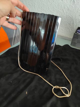 Cartera de fiesta negra y dorada