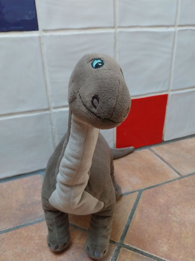 Dinosaurio de peluche