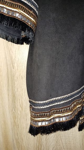 Chaqueta tipo levita de ante en color negro