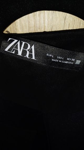 Chaqueta tipo levita de ante en color negro