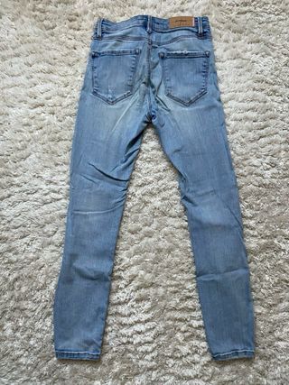 Pantalones pitillo Stradivarius azules