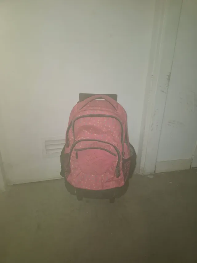 Mochila escolar con ruedas rosa lunares