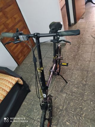 Bicicleta plegable Btwin morada