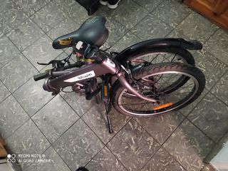 Bicicleta plegable Btwin morada