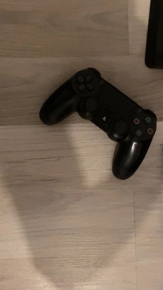 PS4 Slim Negra + 4 Juegos + Auriculares