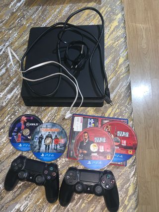 PS4 (PlayStation 4) Negra + Juegos y mandos