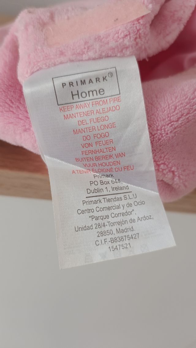 Bolsa de agua caliente rosa con funda de felpa