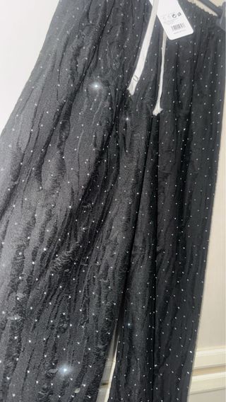 Pantaloni neri brillantinati