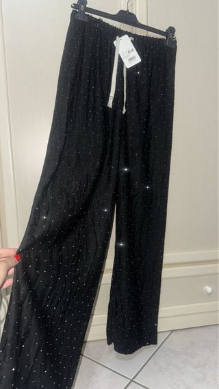 Pantaloni neri brillantinati