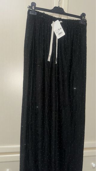 Pantaloni neri brillantinati