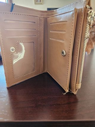 Cartera tejida beige y rosa con borla