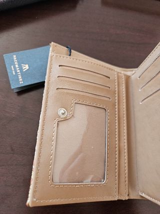 Cartera tejida beige y rosa con borla