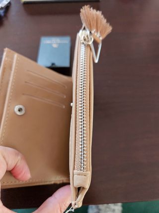 Cartera tejida beige y rosa con borla