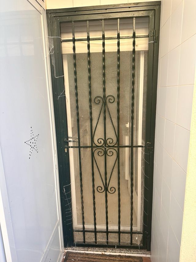 Puertas de hierro forjado con barrotes