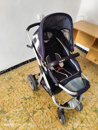 Carrito de bebé con cuco