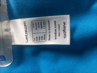 Traje de esquí infantil azul y verde