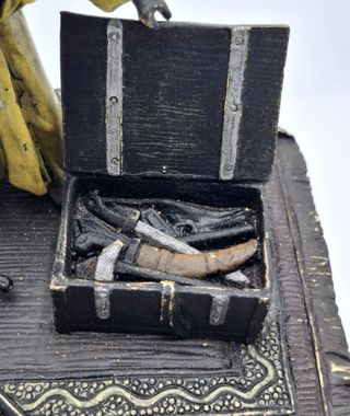 Figura arabe vendedor de armas bronce policromado.