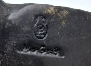 Figura arabe vendedor de armas bronce policromado.