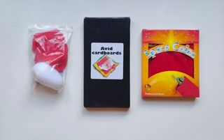 Confezione da 3 trucchi: fazzoletto→uovo, dischi e cartoncino