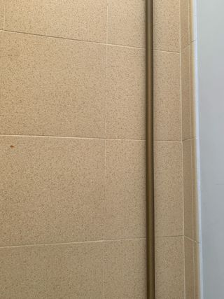 Barra de cortina metálica dorada