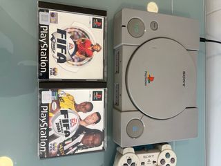 Lote PlayStation 1 gris con juegos