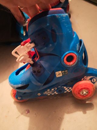Patines infantiles Oxelo azules y rojos