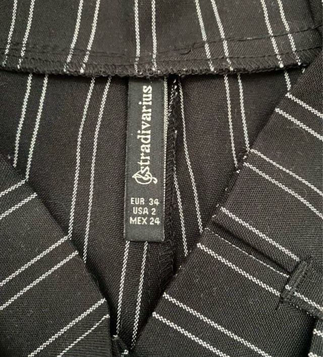 Pantalón corto de rayas con cinturón