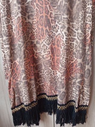 Chaqueta abierta con flecos