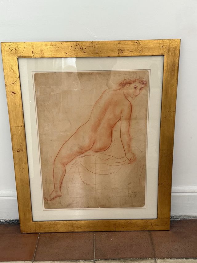 Dibujo de figura masculina sentada firmado
