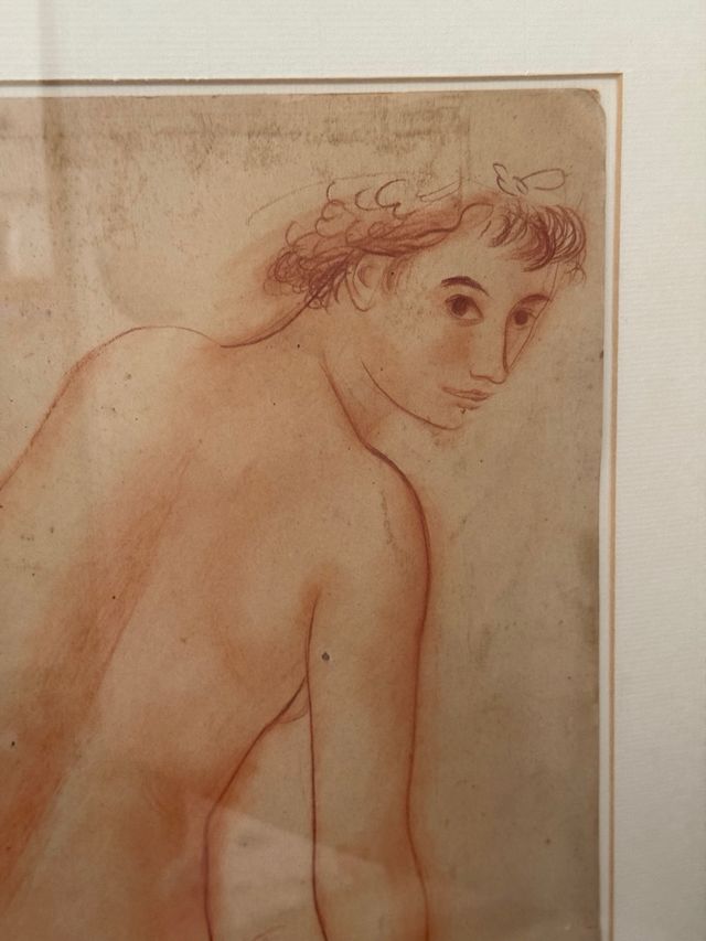 Dibujo de figura masculina sentada firmado