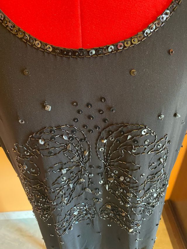 Blusa nera con paillettes e perline