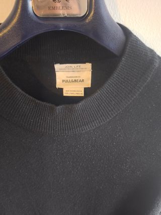 Jersey negro y camisetas