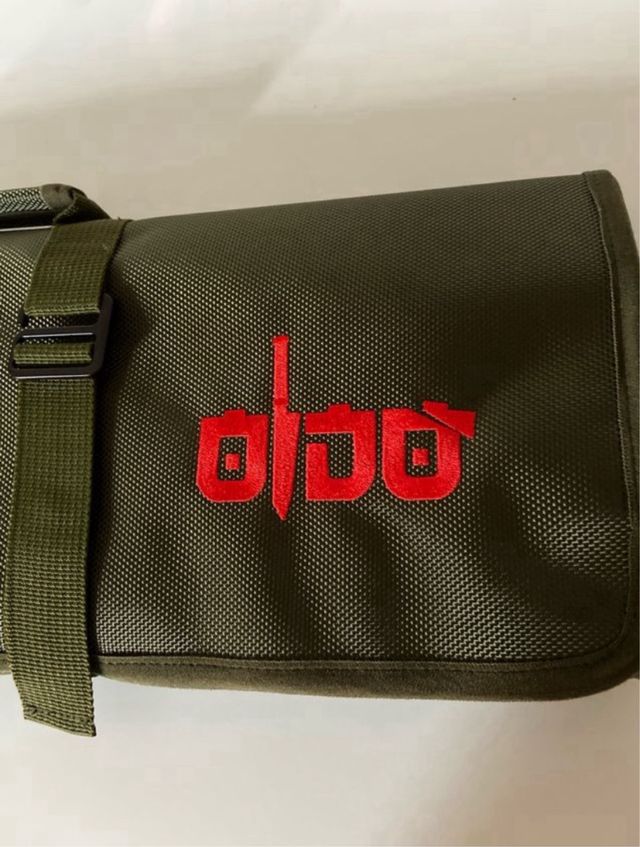 Copri coltello verde con logo rosso