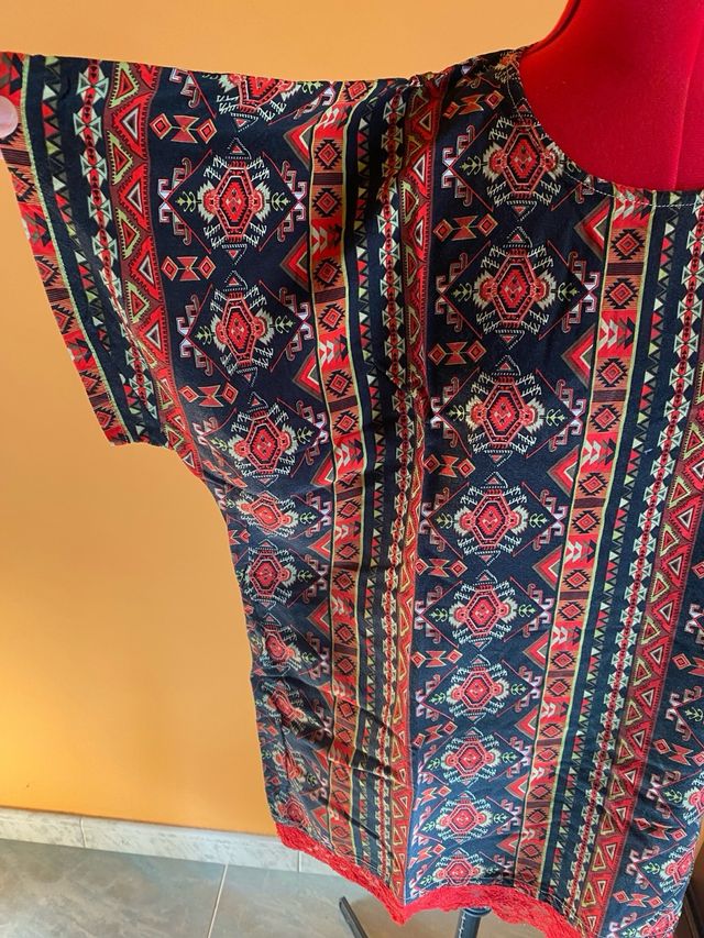 Blusa fatta a mano con fantasia etnica