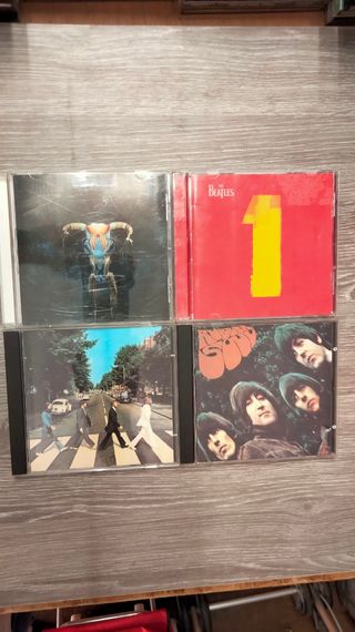 4 CDs 3 The Beatles - 1 Eagles