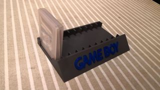 Soporte expositor 10 juegos Gameboy con funda