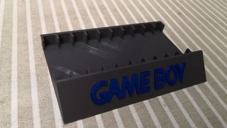 Soporte expositor 10 juegos Gameboy con funda
