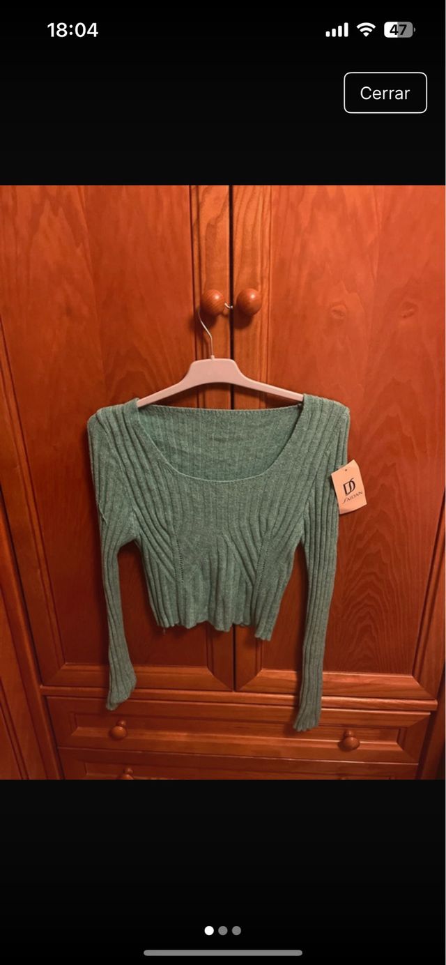 Jersey verde de punto con etiqueta