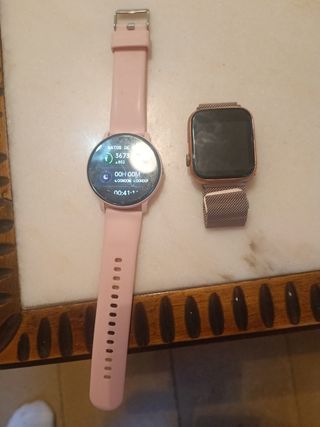 Vendo reloj inteligente rosa y plateado