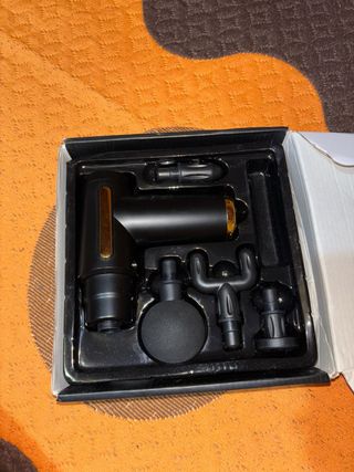 Pistola de masaje