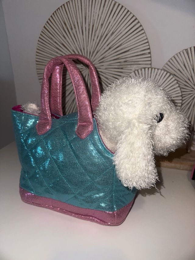 Peluche de perro con bolso brillante
