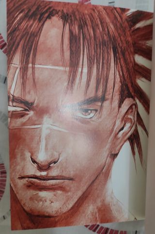 Mangas y libro de postales La espada del inmortal