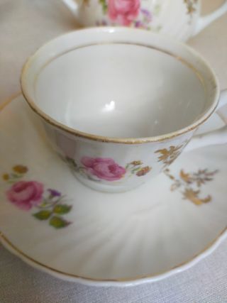 Conjunto de porcelana: tacitas, azucarero y jarrit