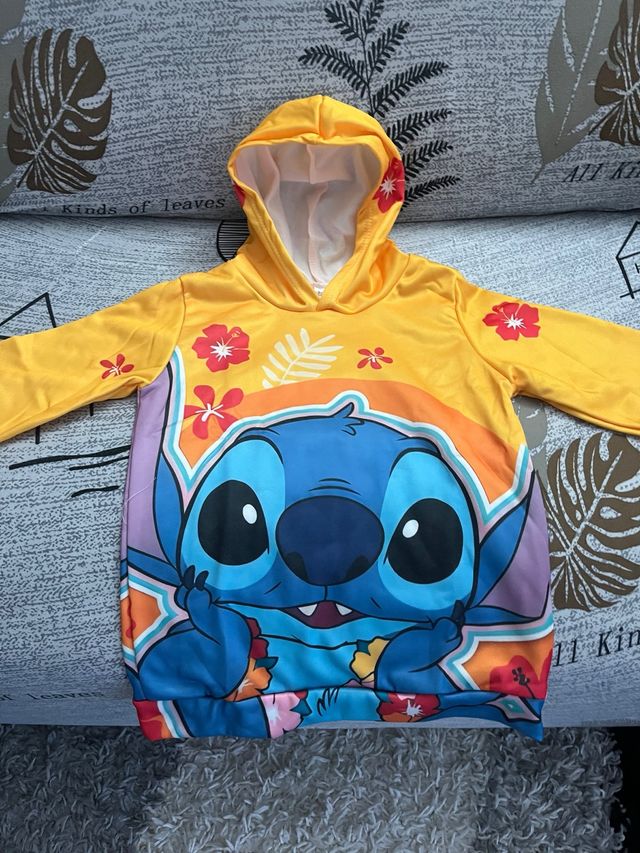 Sudadera Stich Amarilla y Azul.  9- 10 años
