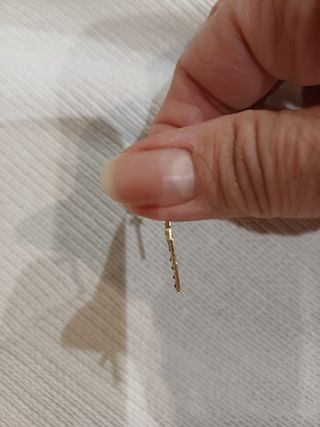 Cruz de oro con esmeraldas