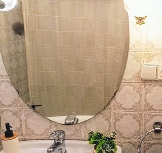 Espejo ovalado para baño