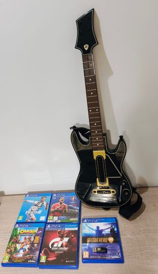 PS4 500GB + 2 mandos + Guitar Hero + 4 juegos