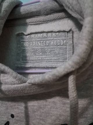 Sudadera gris con texto je ne sais pas para niña