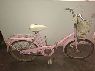 Bicicleta rosa vintage niña